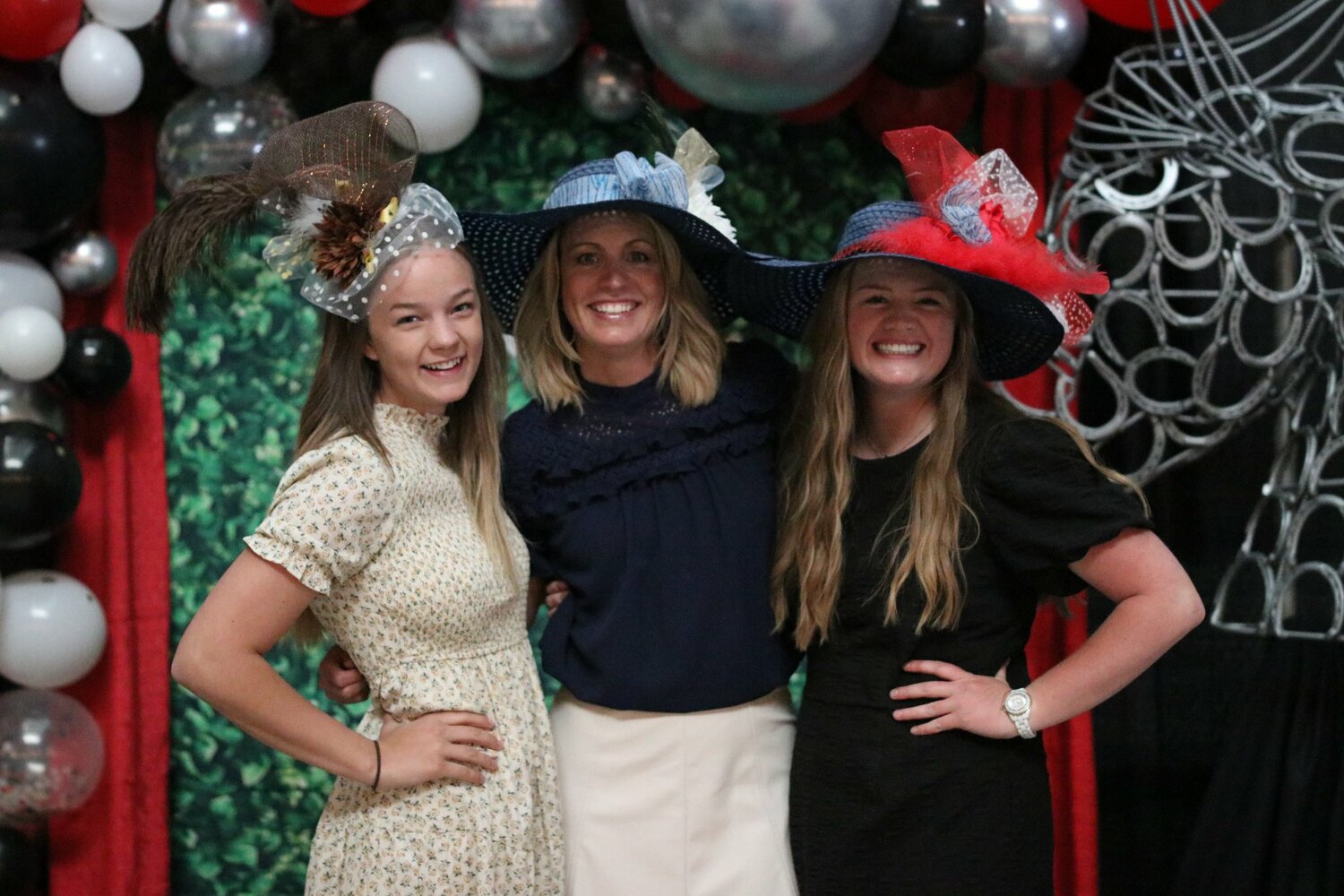 From left, Zoe Bennett, Melanie Bennett and Alexis Bennett show off their Derby hats at the 2022 PFAC Kentucky Derby Party. The event returns this Saturday, May 4 at the Sublette County Fairgrounds and raises money to help support PFAC’s numerous arts programs for kids in the county. Tickets are on sale at Office Outlets in Pinedale and Big Piney and will be available at the door.