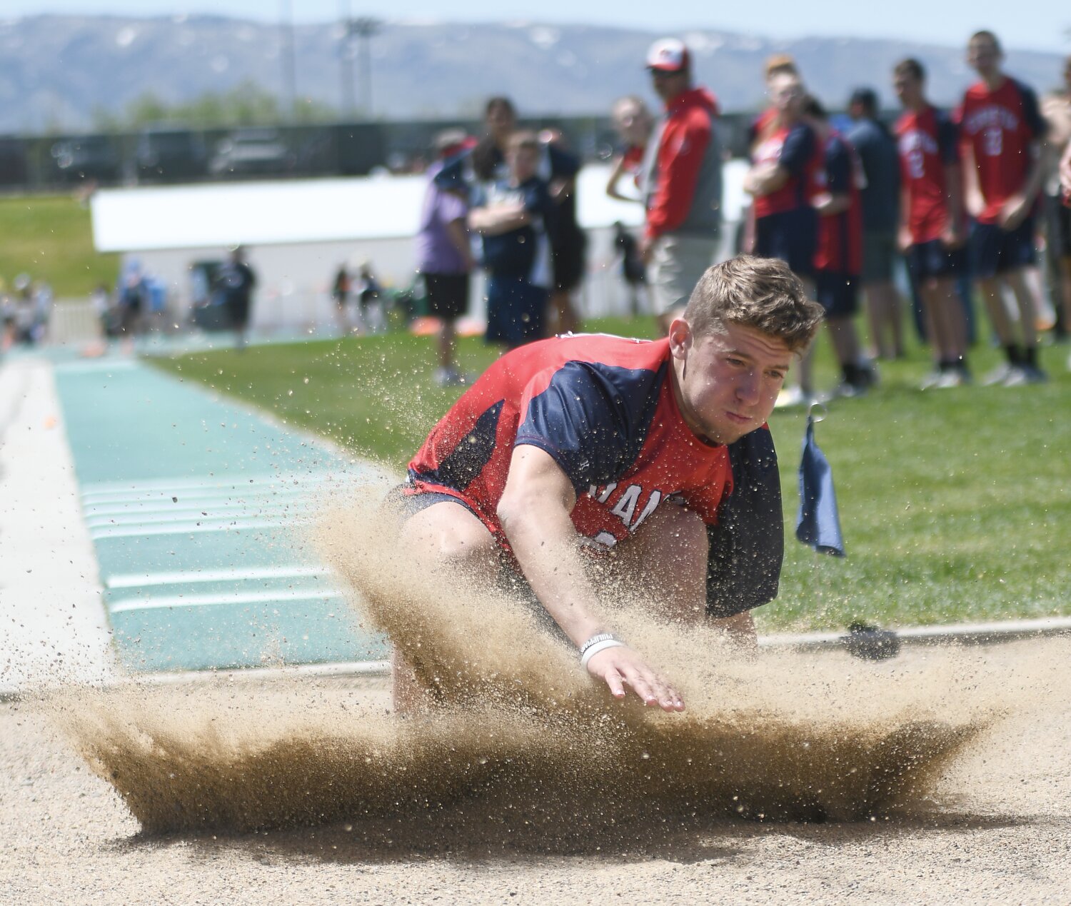 EHS unified partner Caden Hiatt won the long jump event at the first-ever WHSAA State Unified Track and Field Championships. Evanston’s unified team was crowned state champions at the conclusion of the five-event meet.