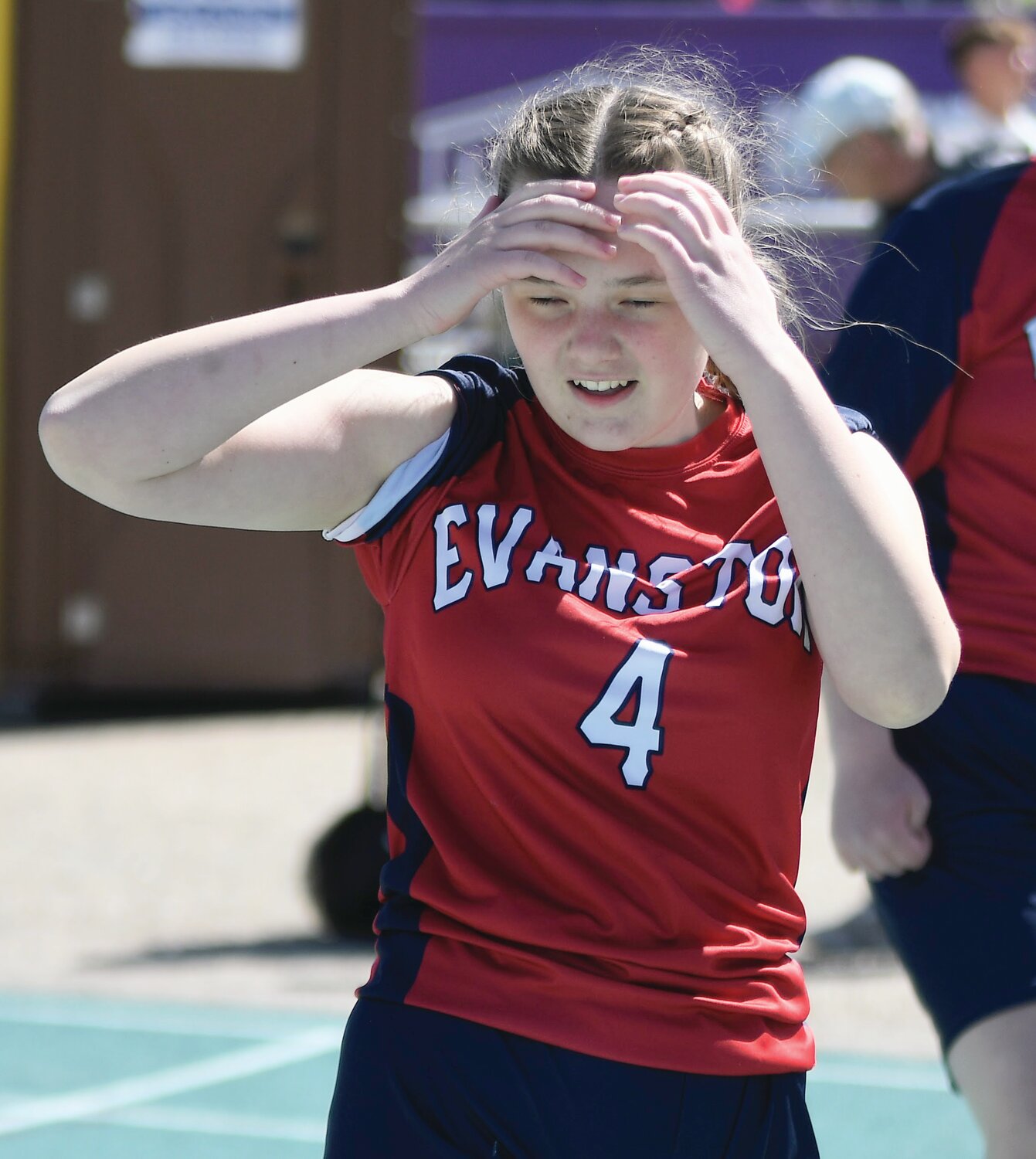EHS unified athlete Jovie Quillinan catches her breath after running the mixed 100 meter dash at the State Unified Track Championships.