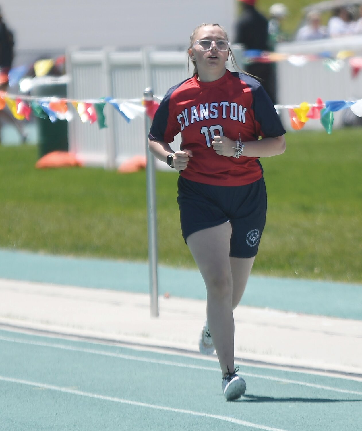 Lady Devil Jade Olson hits the home stretch of the 400 meters during the State Unified Track and Field Championships.