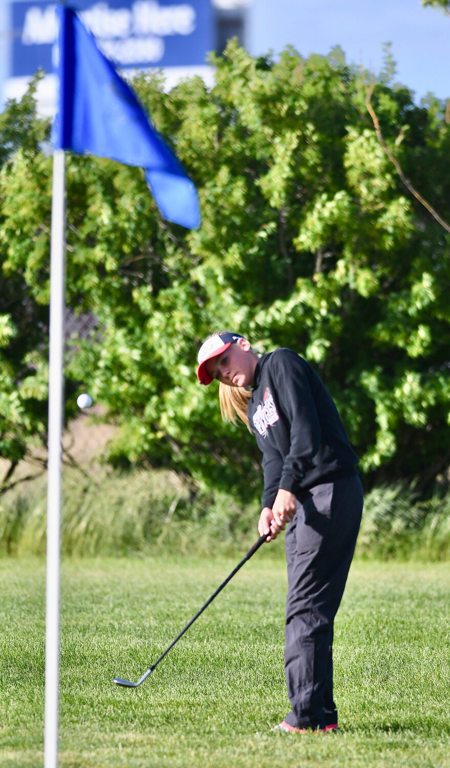 Kemmerer golfer Tazlyn Wagner takes aim at the flag from just off the green Saturday during the second round of the WSGA Amateur Championship, held at Purple Sage Golf Course in Evanston.