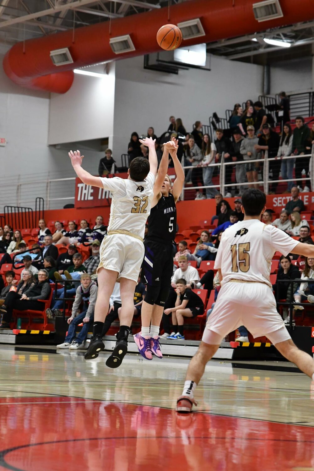 MV senior Casey Walker launches a shot over a Buffalo defender during the Buffs’ 60-55 loss to the Bison at the 3A State Tourney in Casper.