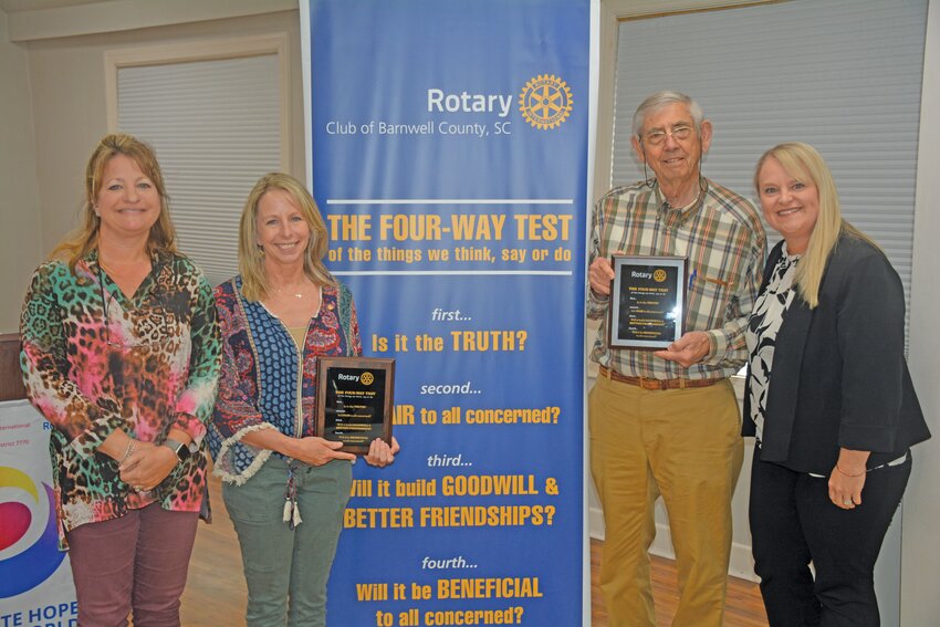 Shellie Bumgarner (second from left) and Reid Boylston (third from left) are the newest members of the Rotary Club of Barnwell County. They are pictured with Rotarians Lynn McEwen and Dr. Crissie Stapleton.