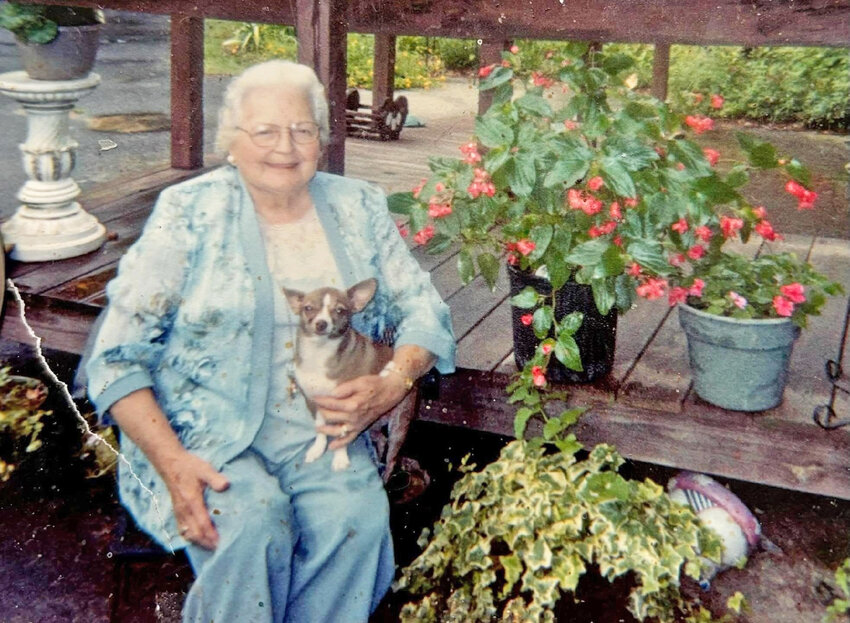 Kitty McCormick many years ago with some of the flowers she cherished.