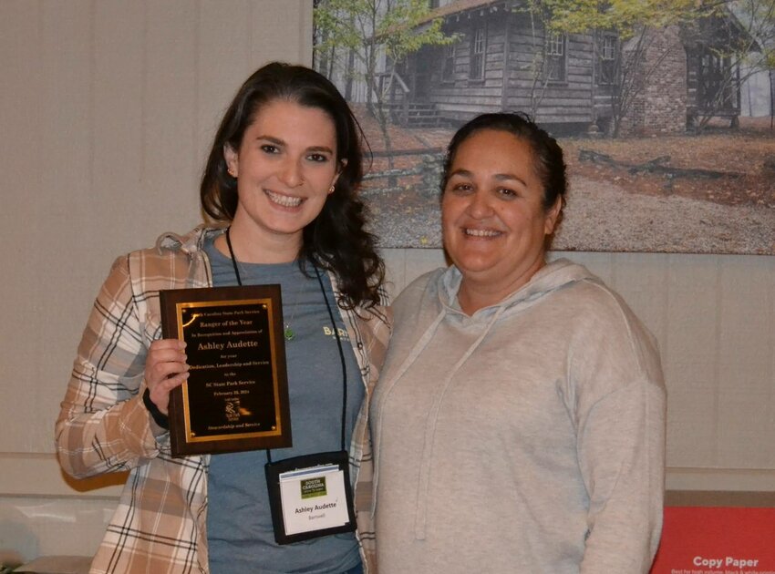Ranger of the Year Ashley Audette (left) receives her award from Regional Chief of the Sandhills Region, Joy Raintree (right).