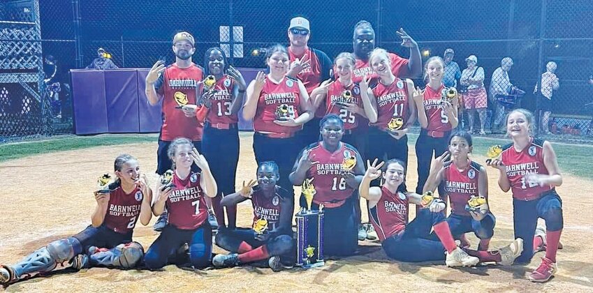 The Barnwell Ponytails All-Stars celebrate their state championship win on June 16 after defeating Saluda. 