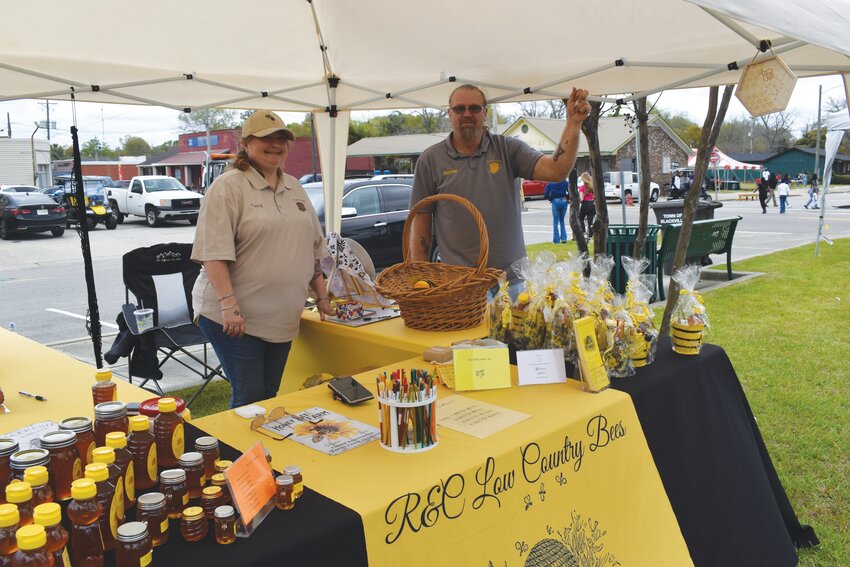 Ronnie & Cassie Moore hosted a booth at the 2024 Blackville Music & Arts Festival to share about their honey products and bee services. 