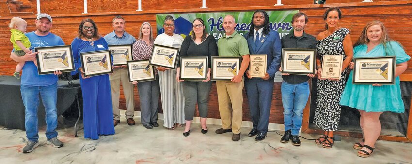 Homegrown Leadership Institute graduates and business leader awardees gather for a photo. From left: Brad Bonnette, Doris Jamison, Scottie Ray, Sharri Cook Shirley, Trina Isaac, Sharon Perella, Kevin Dobson, Marlon Creech, Dennis McCullough, Angela Cotton, and Mattison Bolen.