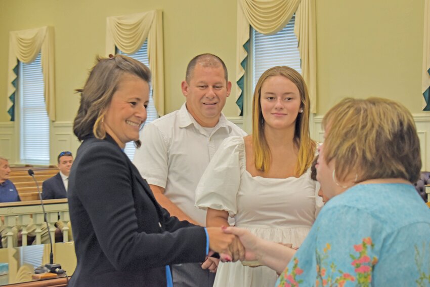 Barnwell County Clerk of Court Rhonda McElveen (right) congratulates the county's newest magistrate judge Carla Deering on July 12 after she was sworn in.