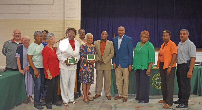 Gwendolyn Littlejohn and Vivian Alston were awarded for their dedication to the Town of Blackville. They are pictured here with past and present members of the town council and other BDDA members. 