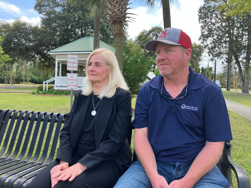 Dale Koukus (left) sits with a former patient of her late husband, Dr. Dean Koukus, a physician who served thousands of patients in the Barnwell region.