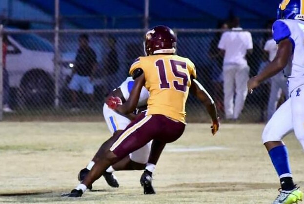 Messiah McFadden, like many Hawks, is important to both the offense and defense. Shown here making a tackle, McFadden also caught a 16-yard TD from Samari Williams.
