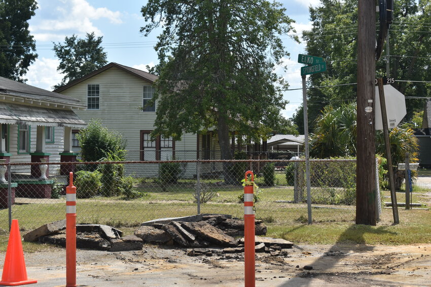 Part of the road at the intersection of Elko Street and Springfield Road in Williston buckled as a result of broken main lines. 