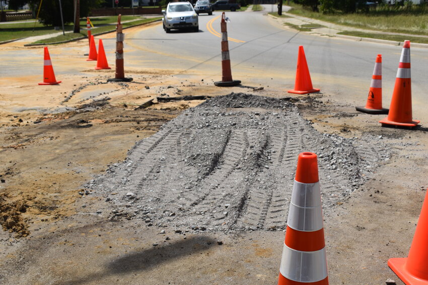 Part of the road at the intersection of Elko Street and Springfield Road in Williston buckled as a result of broken main lines. 