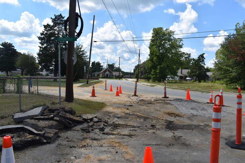 Part of the road at the intersection of Elko Street and Springfield Road in Williston buckled as a result of broken main lines. 