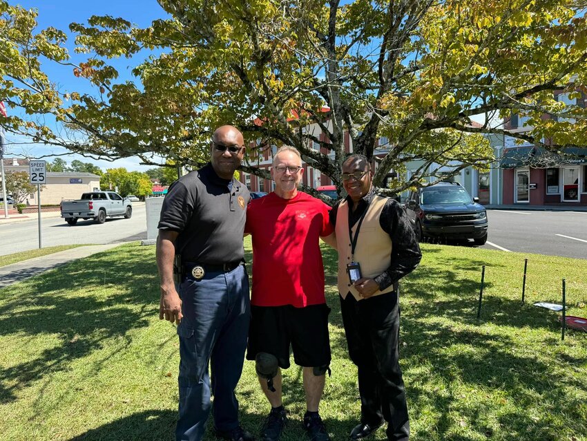 City of Barnwell’s Mayor Ron Still, Lt. Eric Kirkland, and Dr. JB Brown all volunteered to place flags at the annual 9/11 memorial at Calhoun Park. Mayor Still and Dr. Brown are Barnwell High School (BHS) classmates. 