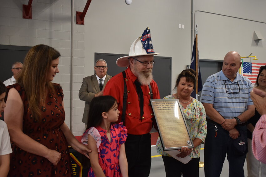 The Dicks' family was honored for their 90 years of combined service to the city's fire department. 