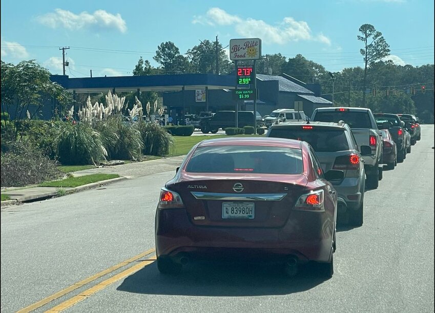 Long lines expanding into the road were a common site at local gas stations after the storm passed.