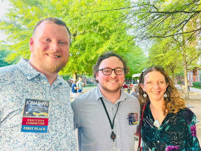 Jonathan Vickery (left), publisher/owner of The
People-Sentinel, caught up with fellow Barnwell
County natives and South Carolina journalists Caleb
Bozard and Seanna Adcox at the opening reception for
the S.C. Press Association's annual meeting April 3.