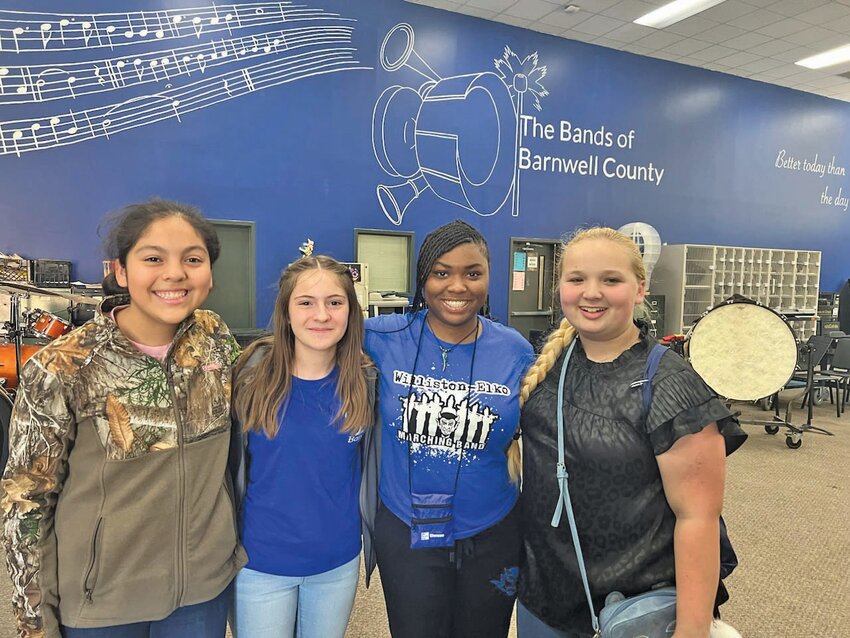 <p>From left: Dahlia Najera (percussion), Leandra Byler (alto saxophone), Ja’Niya Bing (trombone), and Natalee Bruner (percussion) represented Williston-Elko Middle School at Solo & Ensemble.</p>