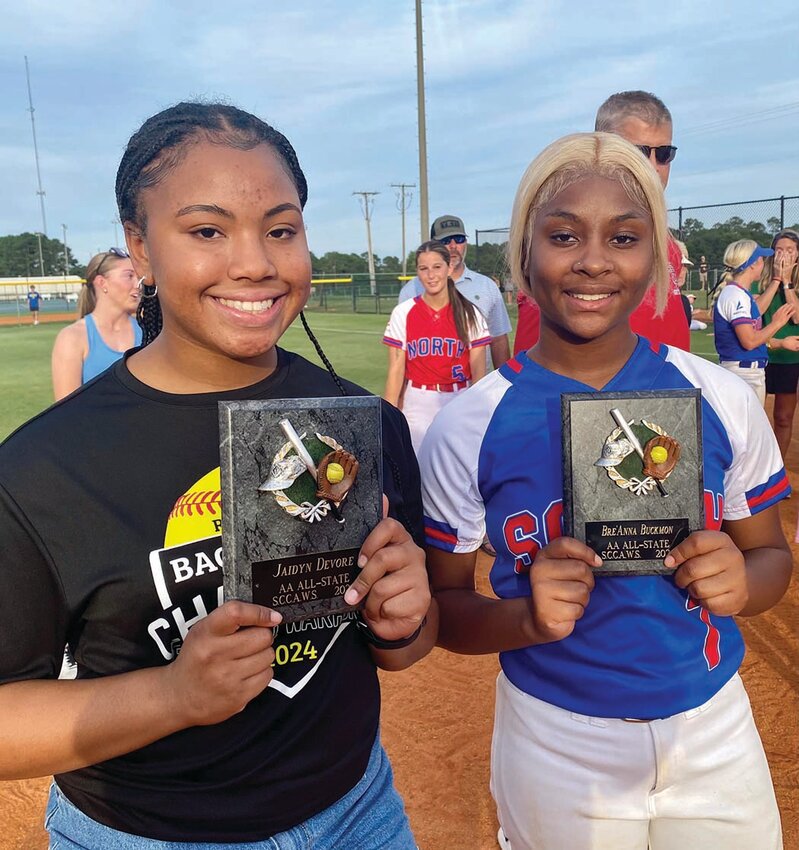 Barnwell High School student Jaidyn Devore (left) and recent graduate Bre’Anna Buckmon (right) were recognized by the South Carolina Coaches Association of Women’s Sports at the Softball North/South game for making the Class 2A All-State team.