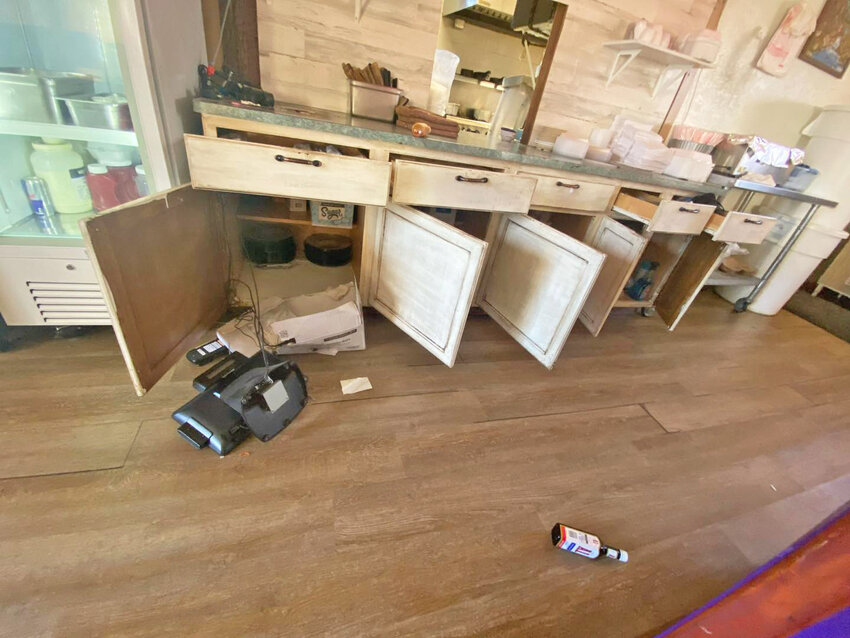 A cash register is shown thrown on the floor of Sombrero's Mexican Restaurant after a break-in on Feb. 28.