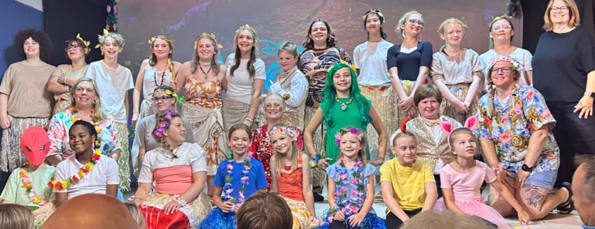Circle Theatre summer campers pose for photos at the end of their performance of "Moana".