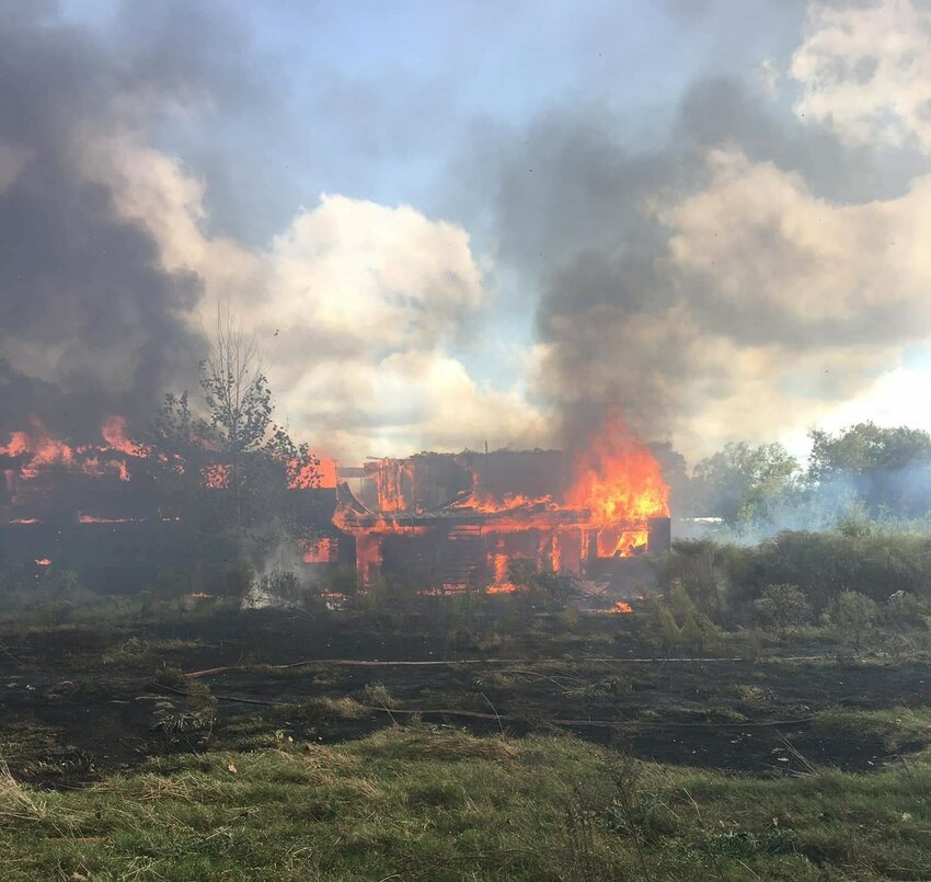 One of several buildings on FM 355 that used to be apartments caught fire on Saturday, needing all fire departments in the county to respond for assistance.