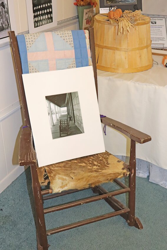 A very meta part of Boucher's exhbit: a print of a rocking chair....on a rocking chair!