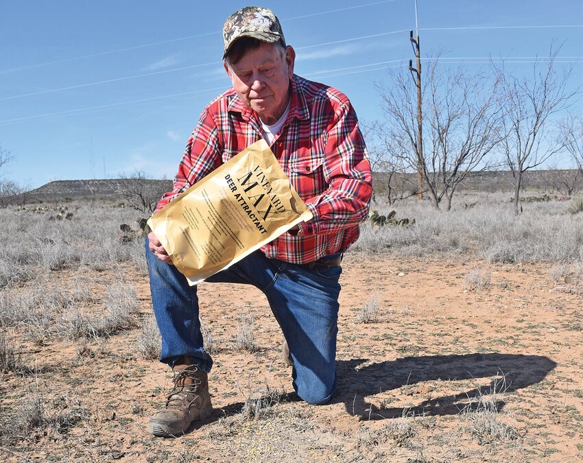 Luke is baiting an area for deer with Vineyard Max Deer Attractant, made primarily with dried grape skins. There are many attractants on the market but this food-based product that emits the smell of grapes brings deer in from a great distance.