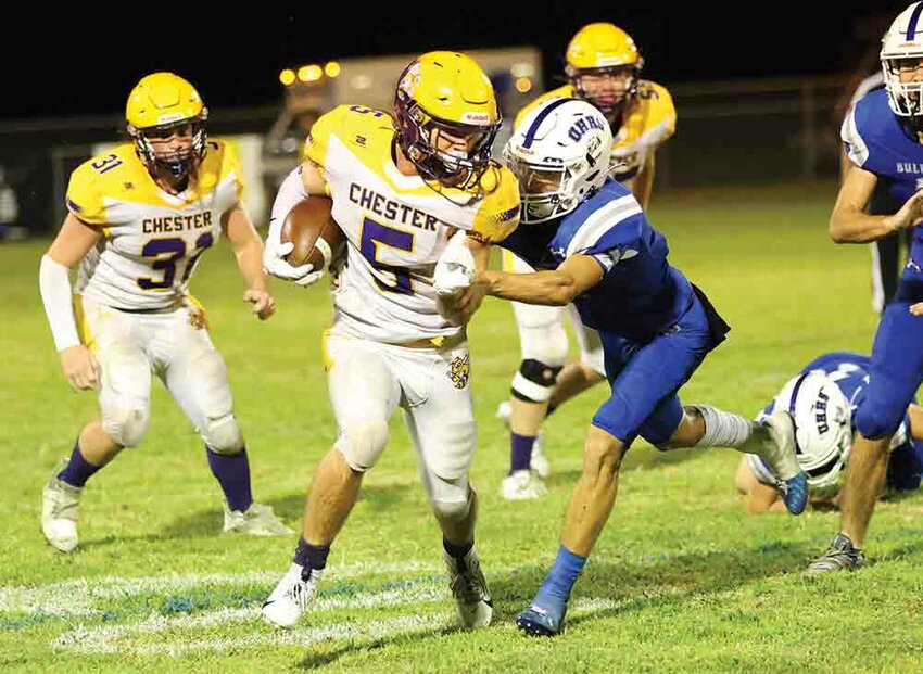 Jaxon Gay (5) breaks through two tackles as Kasen Citrano (31) and Cutter Lowe (55) follow behind. Gay scored two of the three touchdowns against the Union Hill Bulldogs. BECKI BYRD | TCB