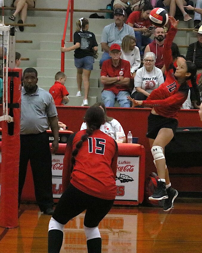 Jannett Bautista goes up for one of her 8 kills.