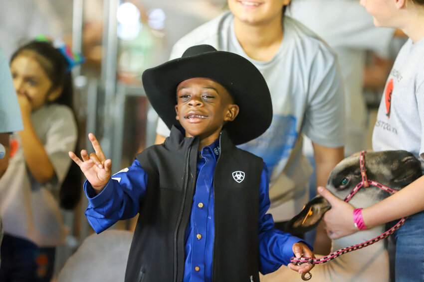 Contestants in the Special Hearts Livestock Show get the opportunity to work with animals and learn what it takes to show the project at the San Jacinto County Fair.