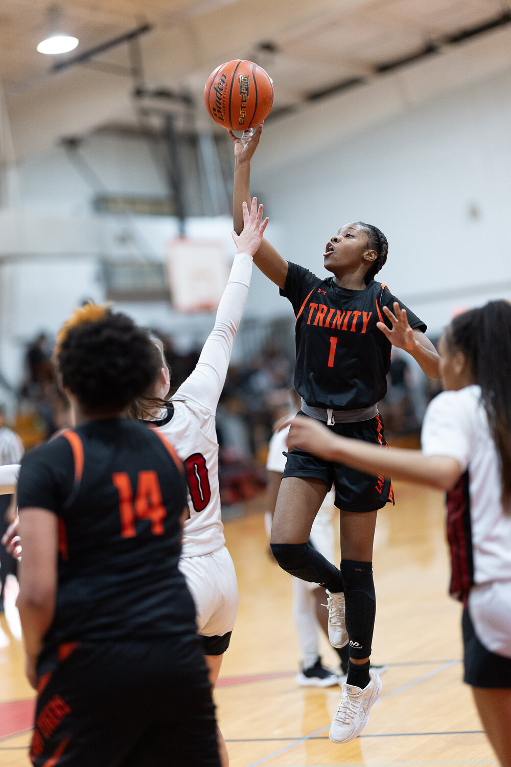 Paetyn Jolly pops a jump shot during the district game against the Coldspring Lady Trojans.