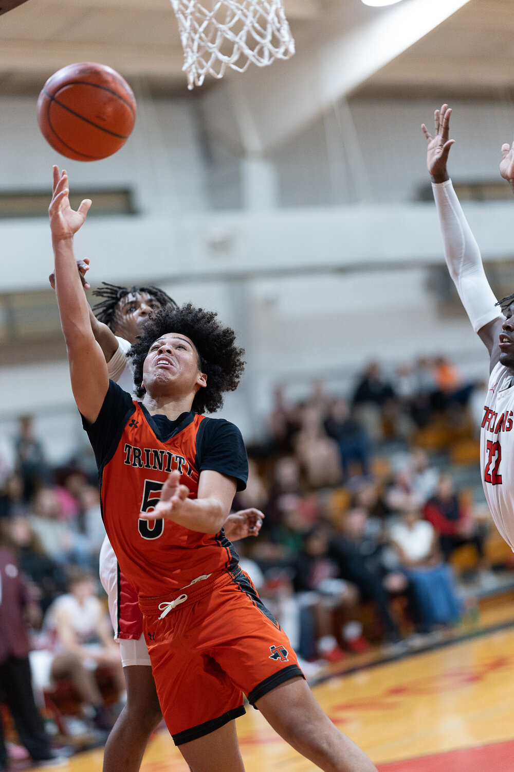 Darryn Bass crashes the boards with a nice layup against the Coldspring Trojans.