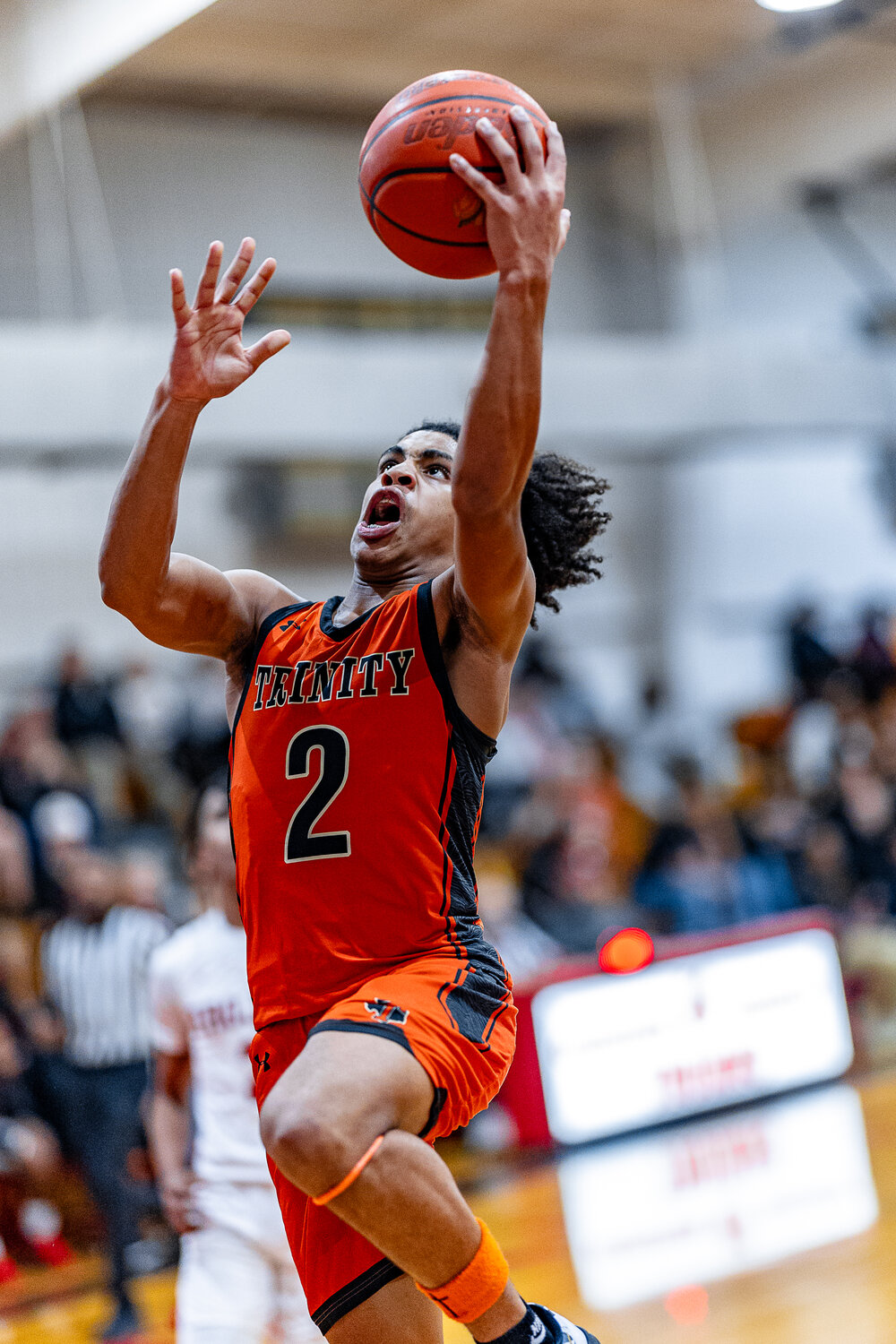 Ayden DeBose jams one home against the Coldspring Trojans.