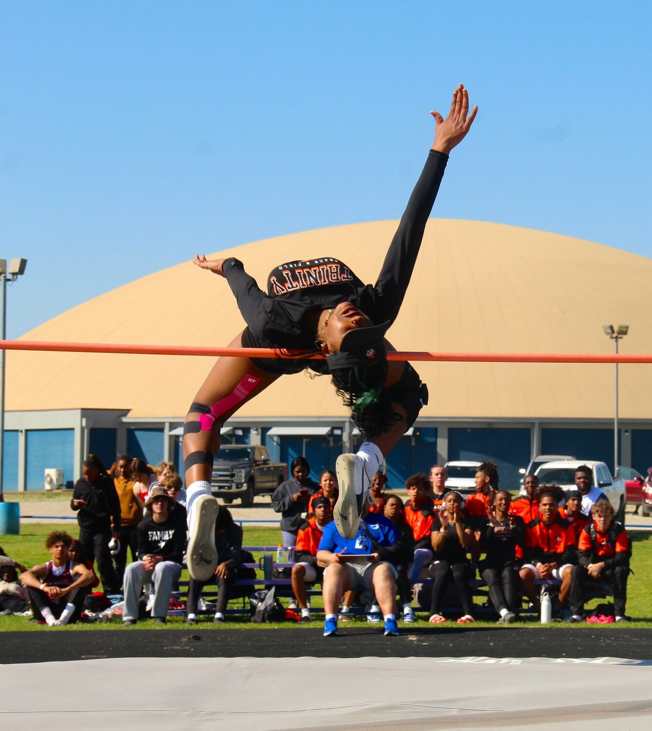 Mariah Lewis leaps to a first in the high jump.