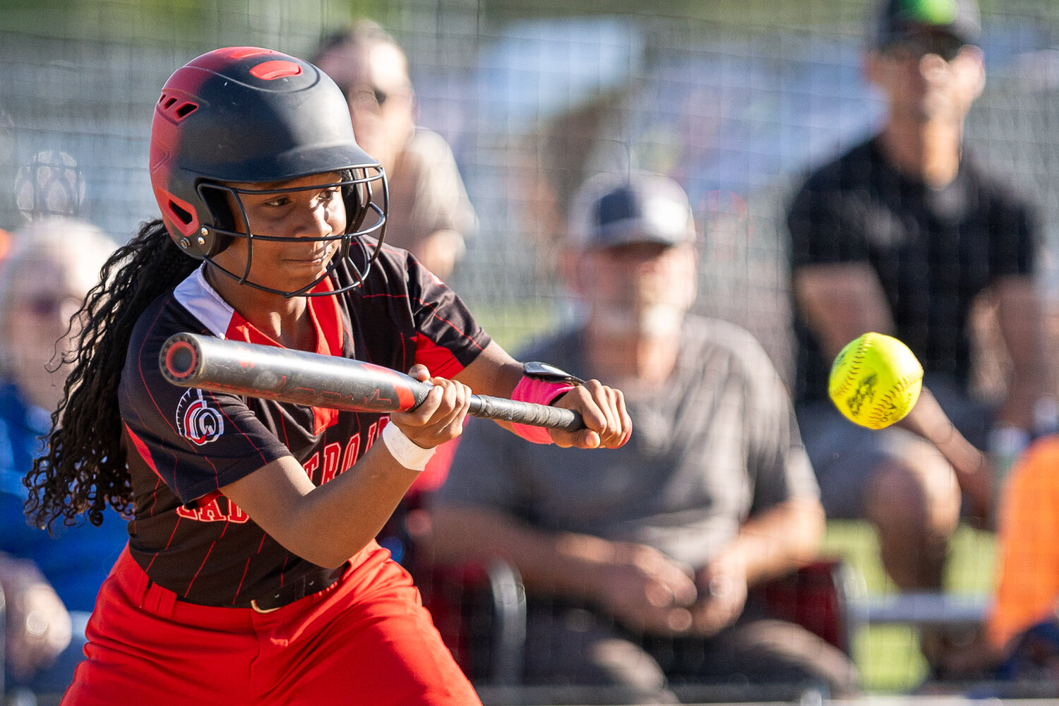 Ciara Phillips locks in on a bunt during the game against the Lady Tigers.