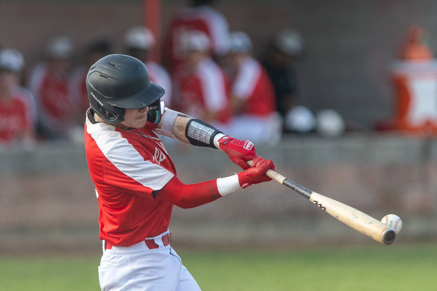 Brennan Headley finds a loose Bulldog fastball and sends it to the outfield on Tuesdays’ Final District game.