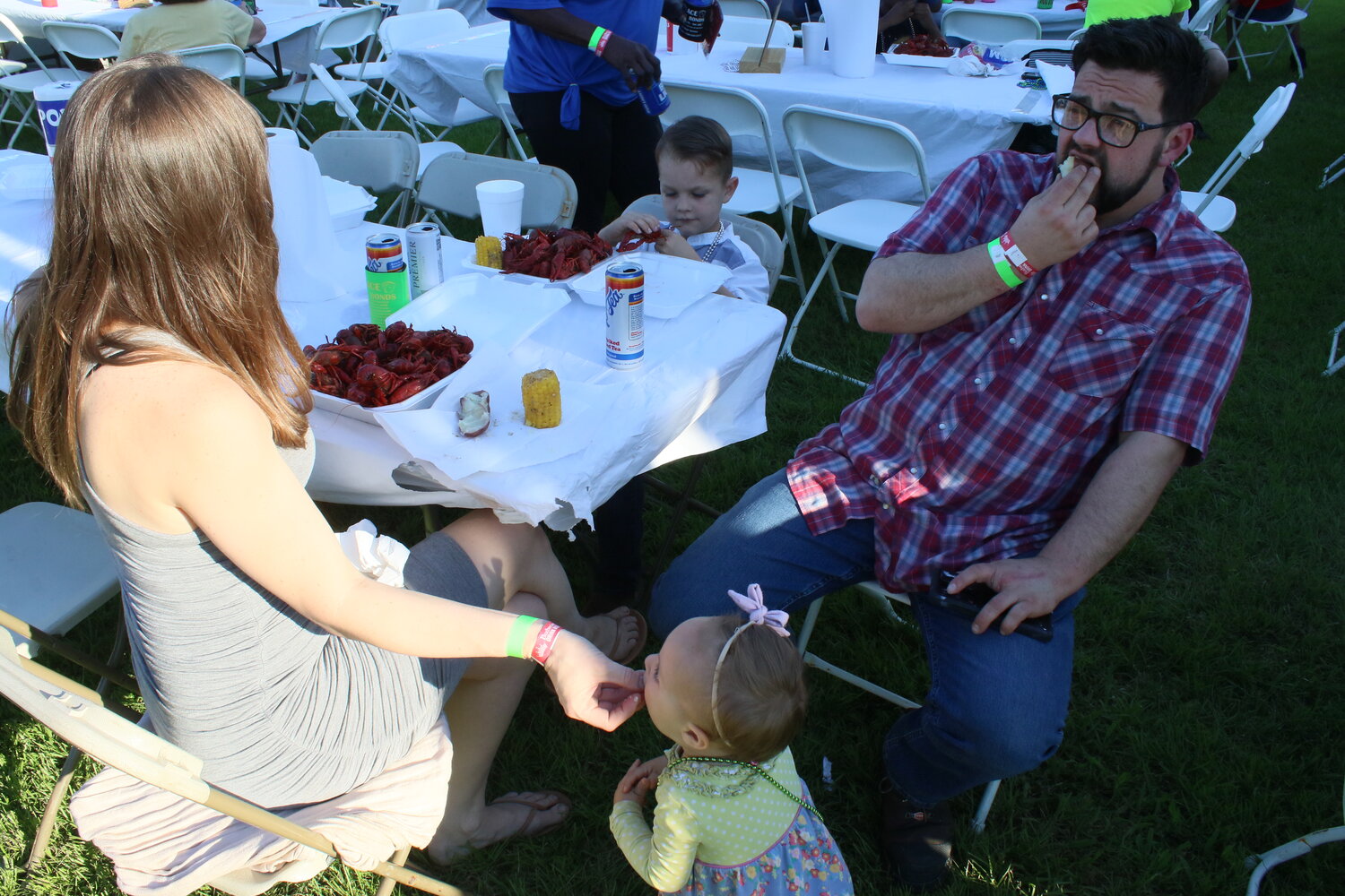 Joanna and Zachary Jones of Stevenson Beer Distributing, along with their children Ezra and Khalayah, enjoy the tasty dinner.