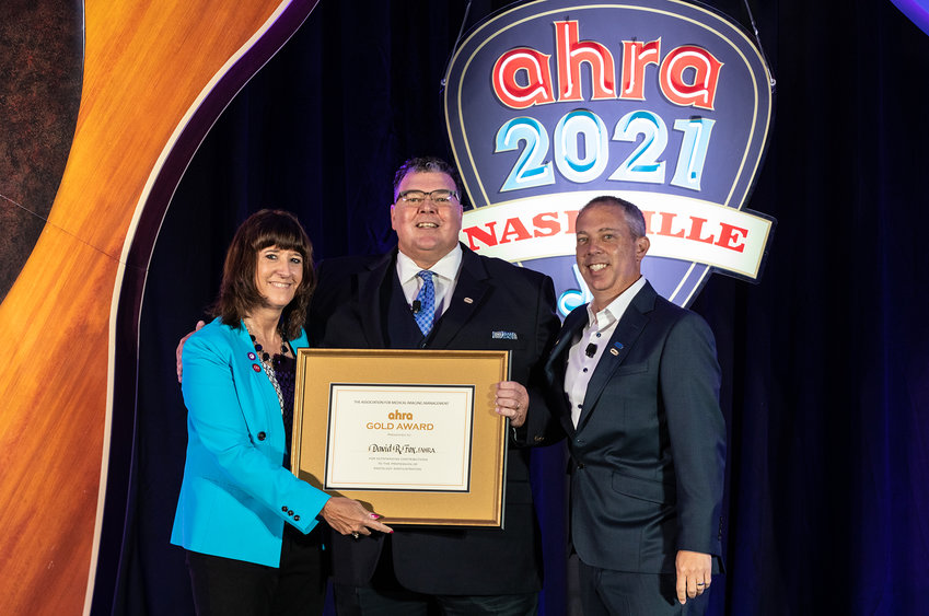 David R. Fox,&nbsp;Baxter&nbsp;Regional&nbsp;VP/COO, accepted the AHRA Gold Award from Jacqui Rose, AHRA President, and Jason Newmark, 2020 AHRA Gold Award recipient, at an awards ceremony at the AHRA 49th Annual Meeting and Expo on Monday, August 2.