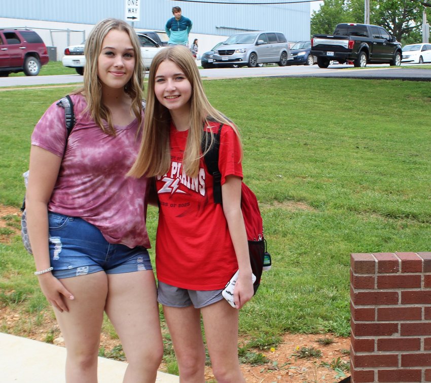 West Plains High School students Brianna Johnson, left, and Madison Melvin celebrate their last day of ninth grade.