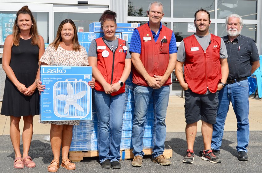 Westlake Ace Hardware recently donated 56 box fans to The Salvation Army of West Plains, to be given to those in need with no questions asked, on a first-come, first-serve basis. The program is facilitated by Ozark Action, 710 E. Main St. With the donated fans, from left: Ozark Action Program Manager Kay Mead and Community Services Director Angie Berry, Westlake Ace department specialist Erin Ramsey, General Manager Jamie Joiner and Assistant Manager of Operations Brandon Hilt, and Ozark Action Community Services Director Terry Sanders.