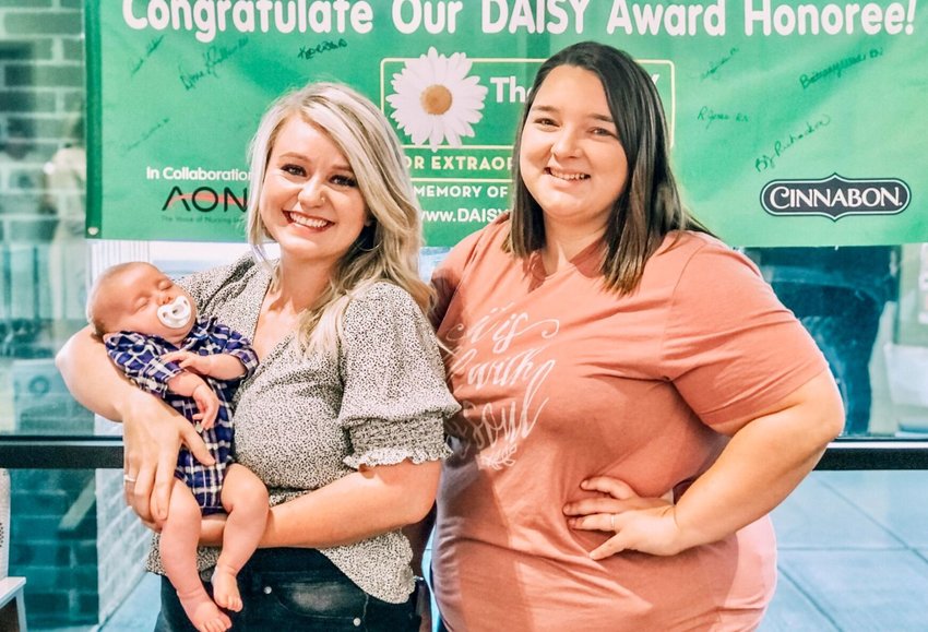 Savannah McCune, right, a registered nurse in Ozarks Healthcare&rsquo;s obstetrics department, was recently presented a Daisy Award for the level of compassionate care she provided to new mother Gretchen Sansegraw and her newborn, left, during delivery.