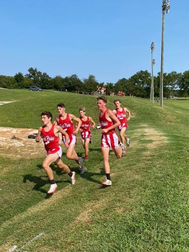 The Zizzers boys cross country team claimed the title of champions at the Joe Bill Dixon Zizzer Invitational with a perfect score.