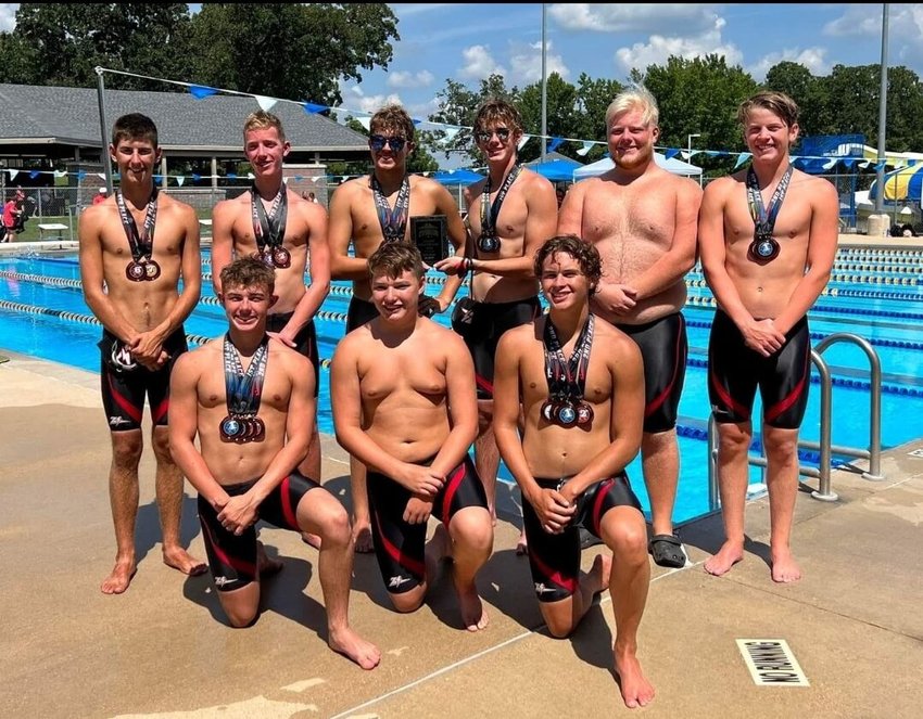 Zizzer Swim Team first row, from left: Avery Miller, Bryson Kittrell, and Elias Curtis. Second row: Toby Keith, Landen Johnson, Holding the 2nd place plaque from the Zizzer Invitational Team Captains Ethan Squires and Isaac&nbsp;Kammerer, James Allchin, and Dawson Fiorino.