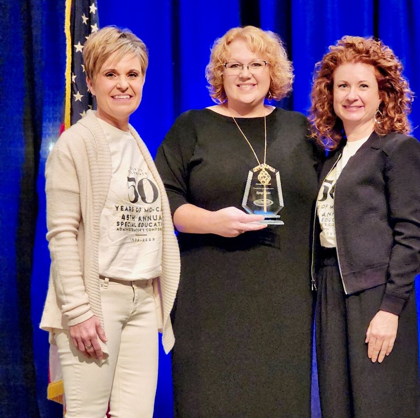 West Plains R-7 Assistant Superintendent of Special Programs Dr. Amy Ross, center, was honored Monday with an award recognizing her contributions to the field of special education in Missouri. Presenting her with the award are, from left, Missouri Council of Administrators of Special Education President Dr. Ashley Krause, Farmington R-7 School District, and President-Elect Marlena Walley, Raymore-Peculiar School District.