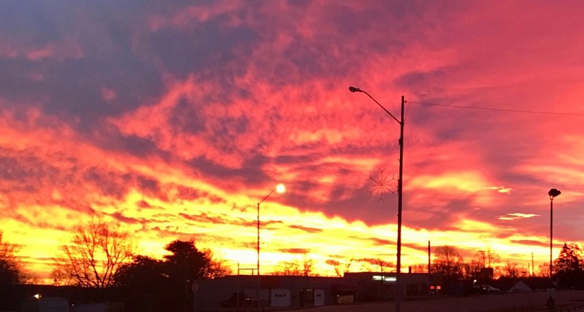 A sunrise overlooking Porter Wagoner Boulevard.