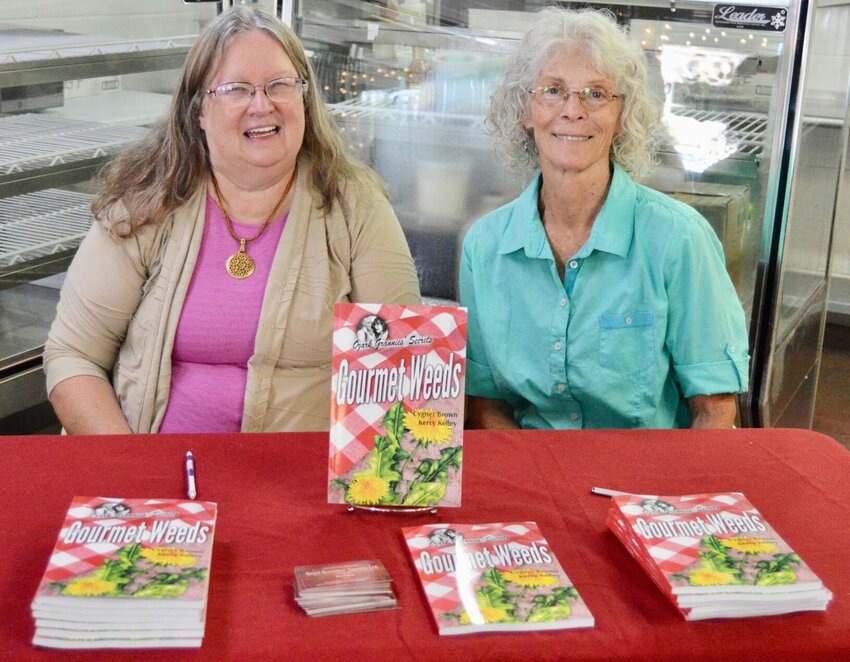 Authors Cygnet Brown, left, and Kerry Kelley have written &quot;Gourmet Weeds,&quot; a collection of recipes made with foraged ingredients and household staples, sprinkled with Ozarks wisdom and history. The book is available at some area farmer's markets, the Old-Time Music, Ozark Heritage Festival on Friday and Saturday in West Plains, and online at walmart.com, amazon.com, barnesandnoble.com, and bookshop.org.
