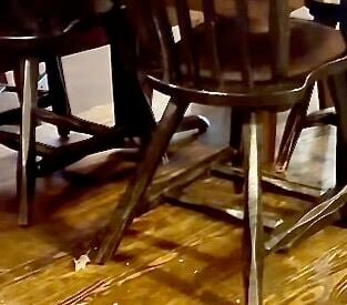 This still frame from a video captured last Friday by Cabool resident Tom Smith shows a mouse in the lower left, running around a chair leg.
